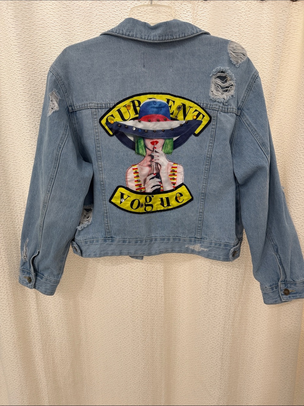 Fashion Nova Light Wash Denim Jacket -with Vogue appliqué on back